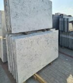 white colonial granite slabs